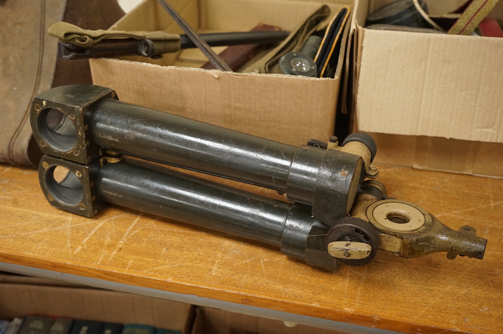 A collection of militaria including; a US Air Force camera Type N-6, a leather cased Bell & Howell Sportster camera and accessories, a pair of periscope binoculars, a leather cased compass by Goerz, Berlin
